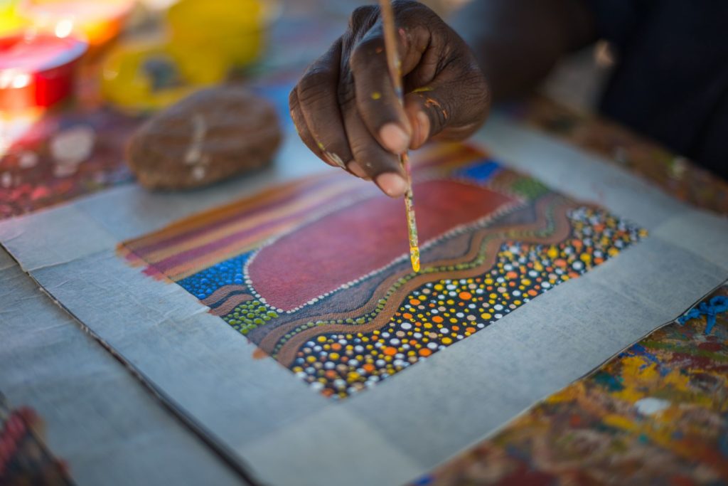 Dot painting at Maruku Arts (Mandatory credit - Tourism NT - Matt Glastonbury)