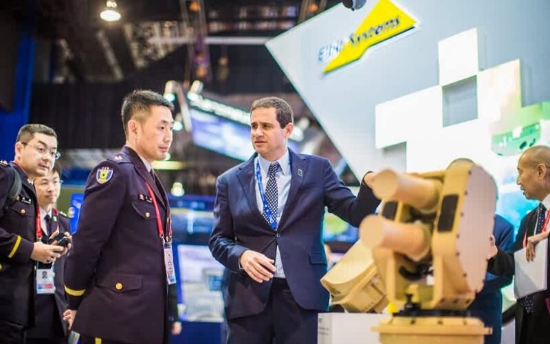 Group of people at the event STB Singapore Airshow in hall