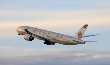 Etihad Airways Boeing 777-200LR taking off at LAX Airport